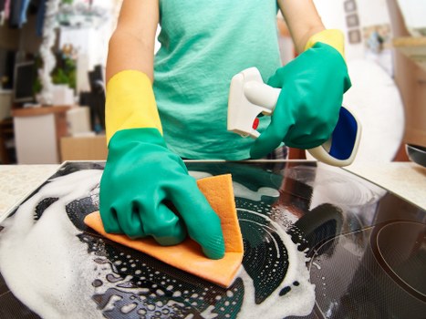Professional cleaners maintaining a Queenspark office reception area